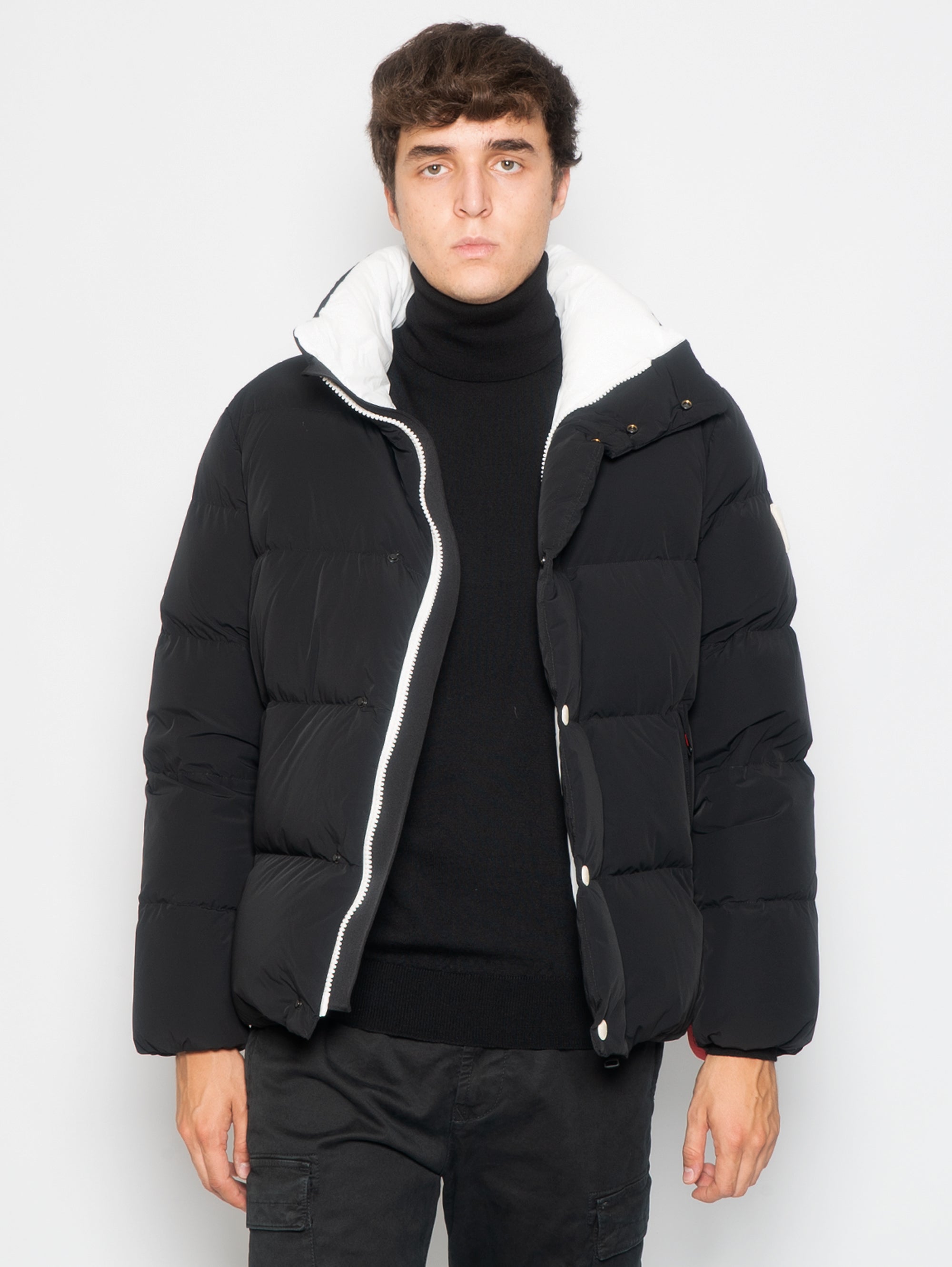 Short down jacket with high collar in matte black nylon