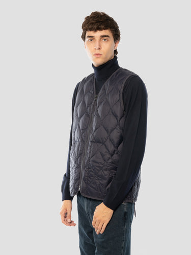Gilet léger matelassé à motifs ondulés bleu marine