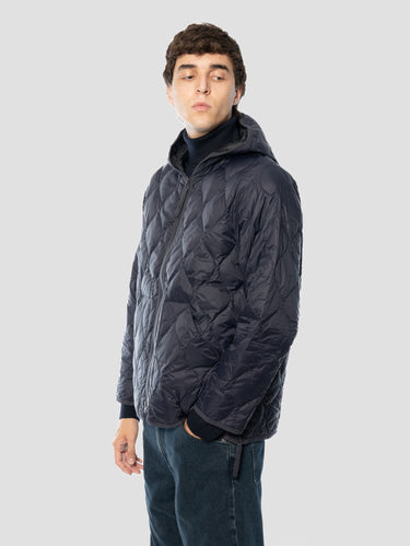 Marineblauwe lichtgewicht donsjas met golfquilt en capuchon