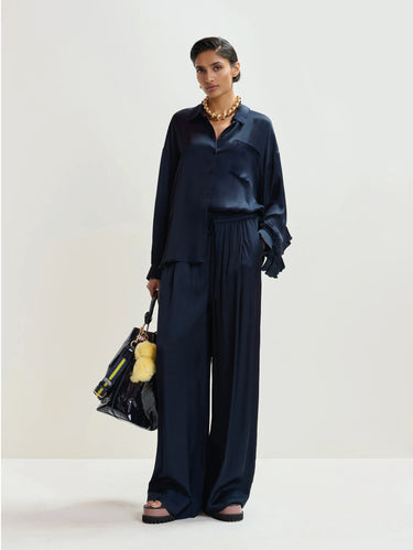 Oversized blouse met volant aan de mouwen blauw