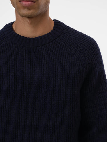 Blauer Rippenstrickpullover aus Wolle