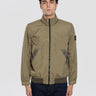 STONE ISLAND-Giacca in Reps di Nylon dall'Aspetto Stropicciato Verde Militare-TRYME Shop