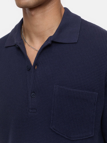 Polo en tissu gaufré bleu