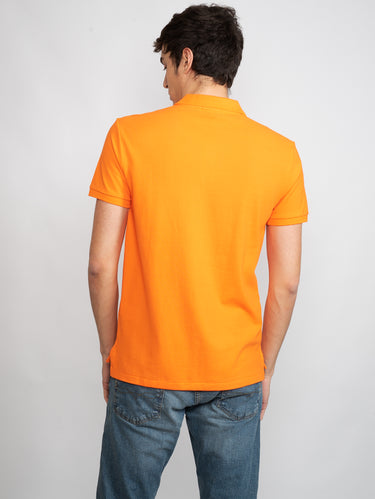 Polo aus Piqué Slim Fit in Orange