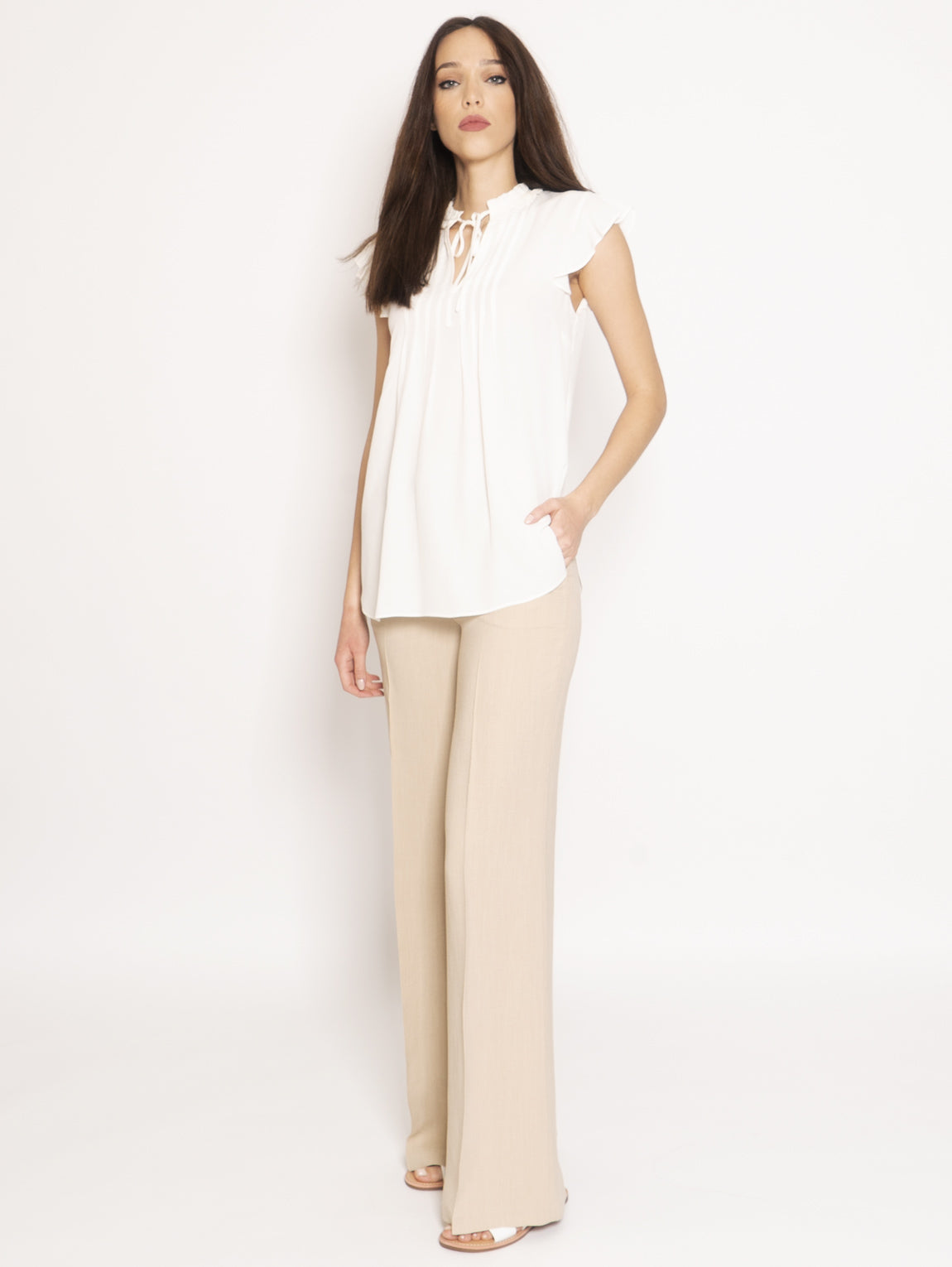 Canvas trousers at Palazzo Beige