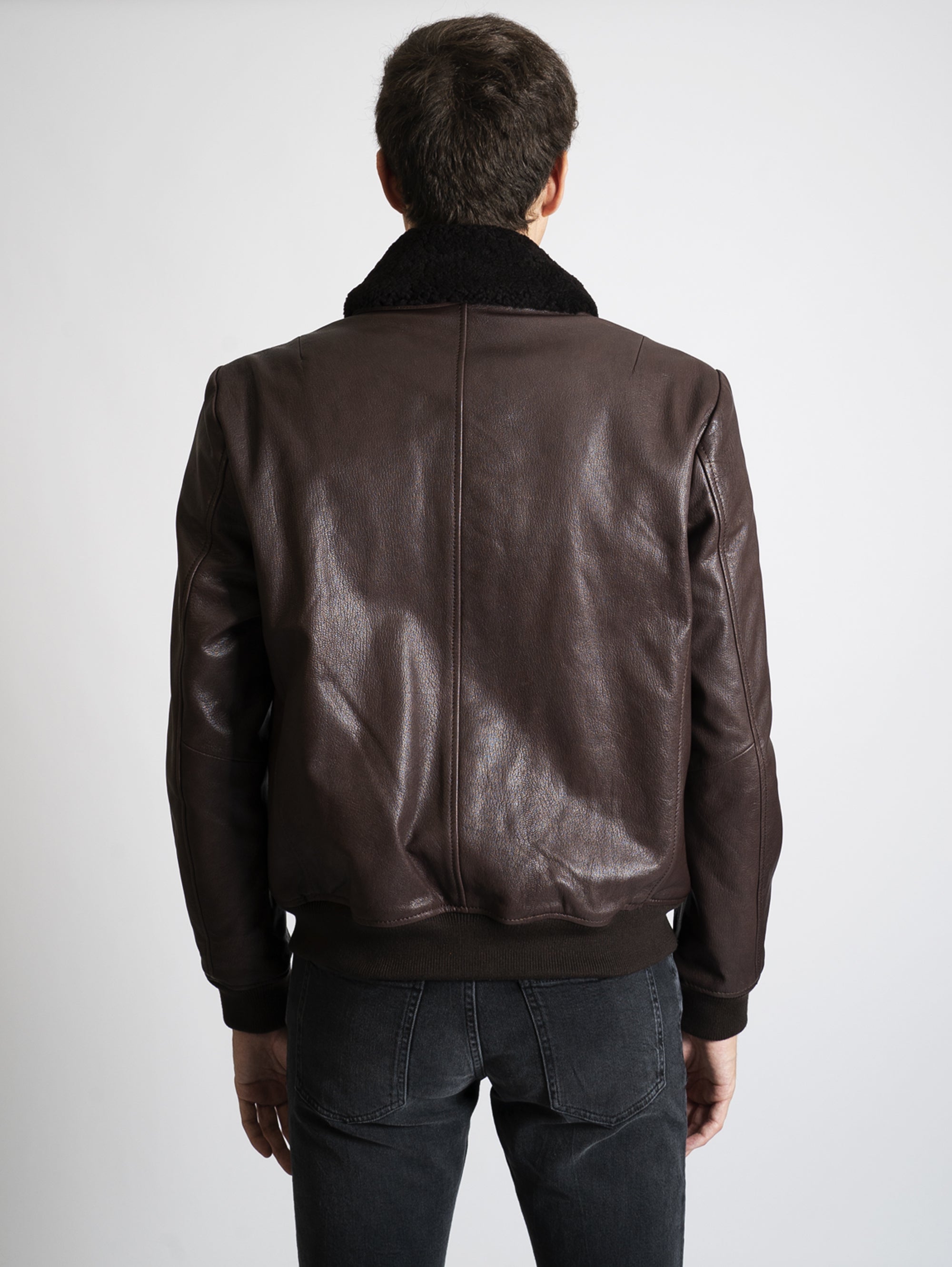 Leather jacket with dark brown sheepskin collar
